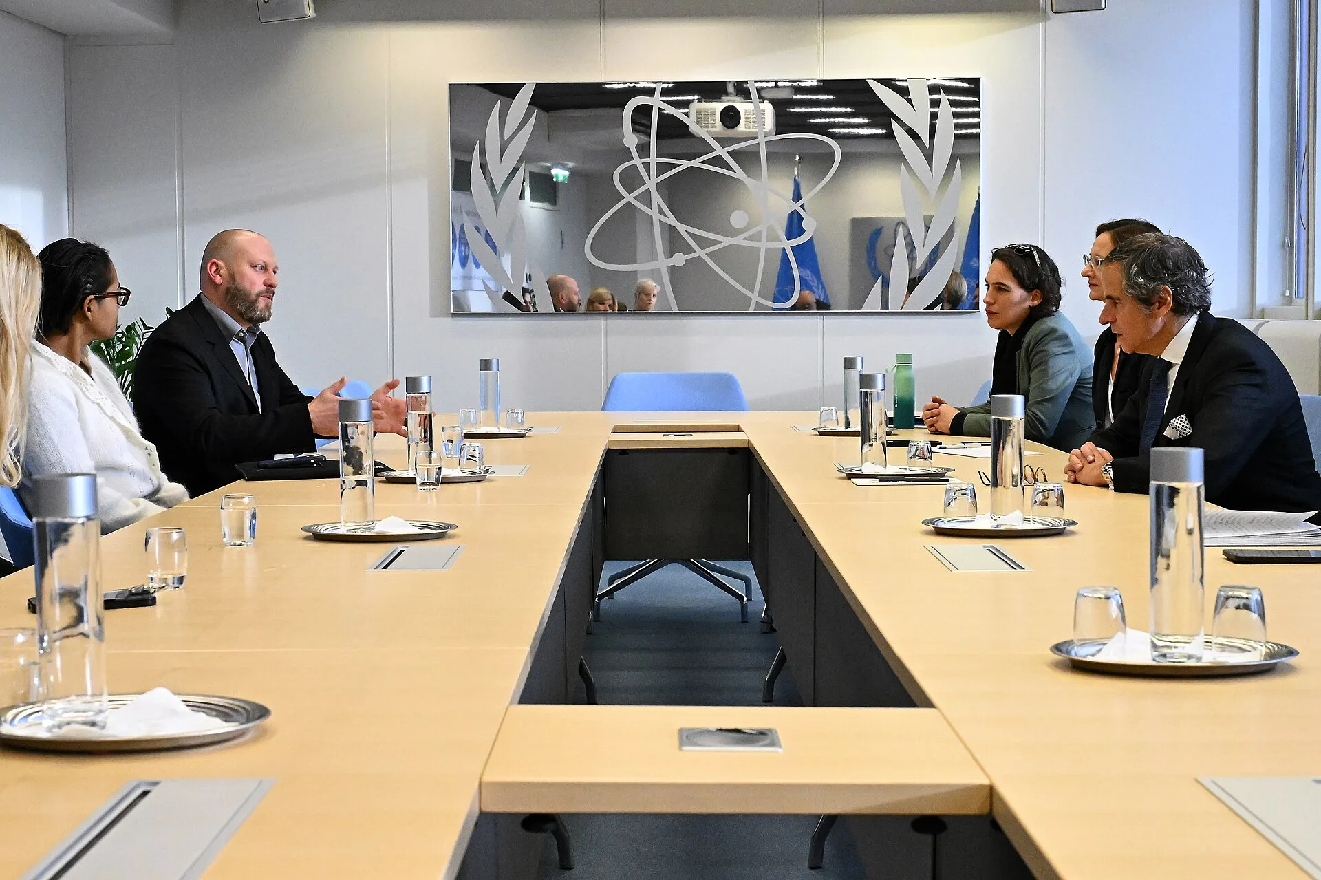IAEA Director General Rafael Mariano Grossi and Jamie Cooke, General Manager Warner Bros. Discovery for Central Europe, Middle East & Turkey, signs the agreement between the International Atomic Energy Agency and the Discovery Channel at the Agency headquarters in Vienna, Austria. 12 December 2024 P