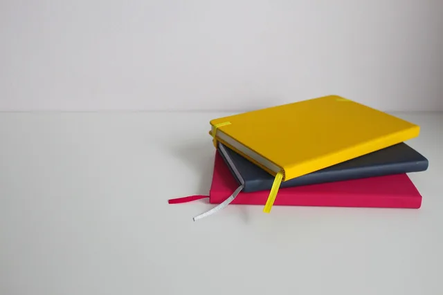 notepad, note, write, paper, news, blog, writing pad, table, decoration, blogger, planning, office, marketing, students, corporate, notebook, professional, communication, strategy, plan. How to split event marketing team roles when the work spans data and sources
